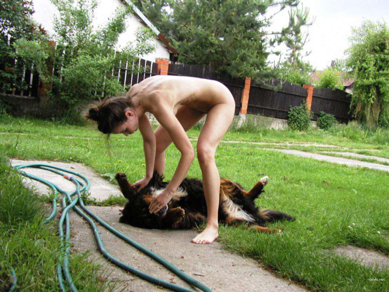Explicit Amateur Porn: Woman Naked Playing with Dog and Having Sex