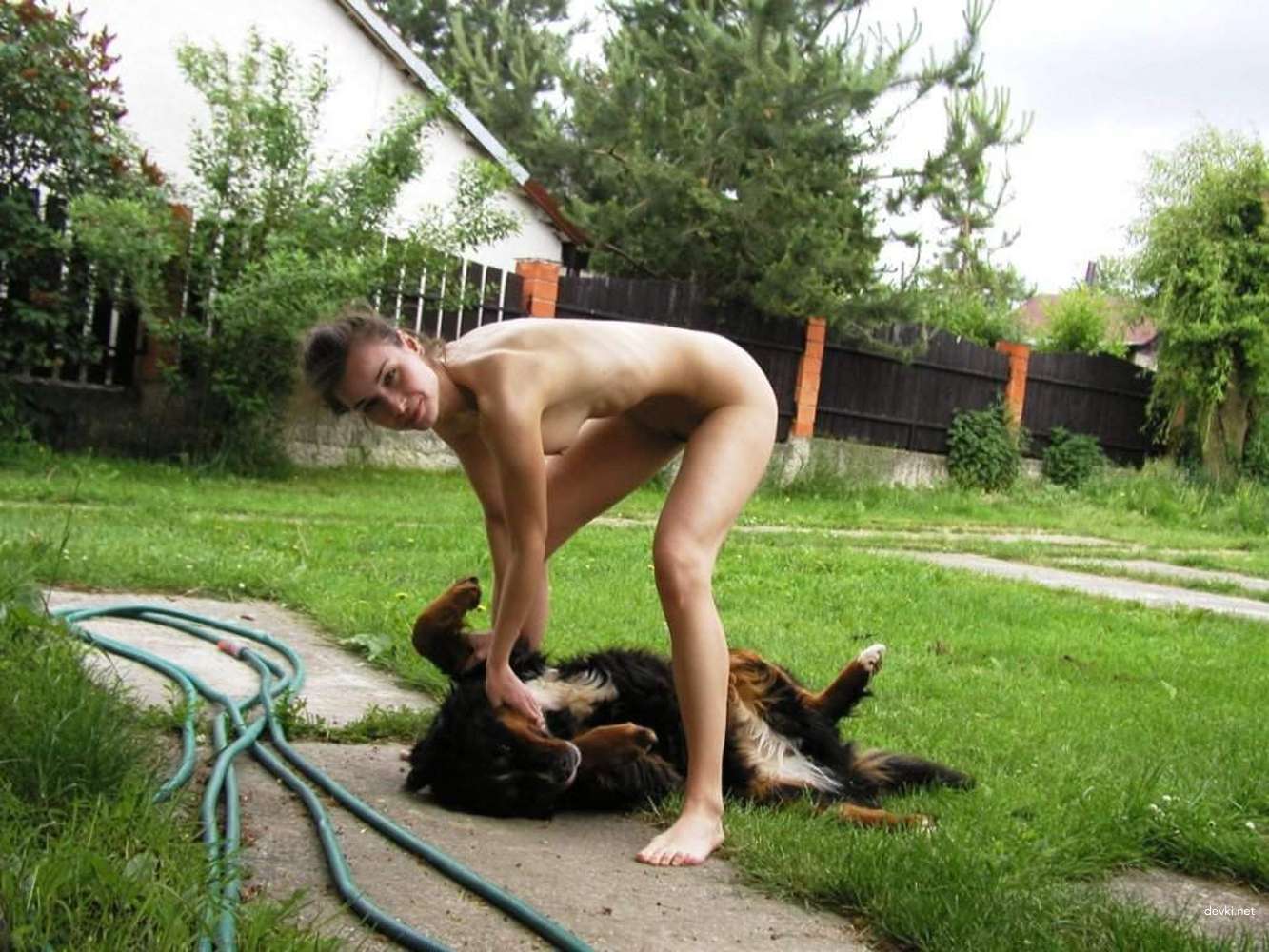 Explicit Amateur Porn: Woman Naked Playing with Dog and Having Sex