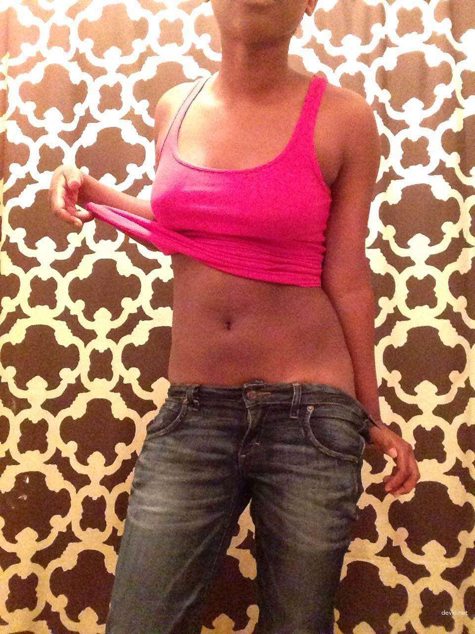 Amateur Babe Captures Her Boobs in Provocative Selfies