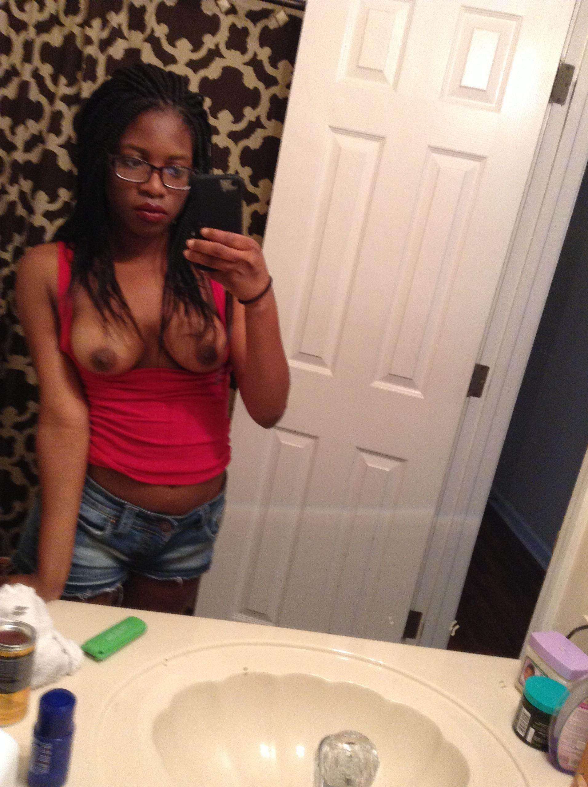 Amateur Babe Captures Her Boobs in Provocative Selfies