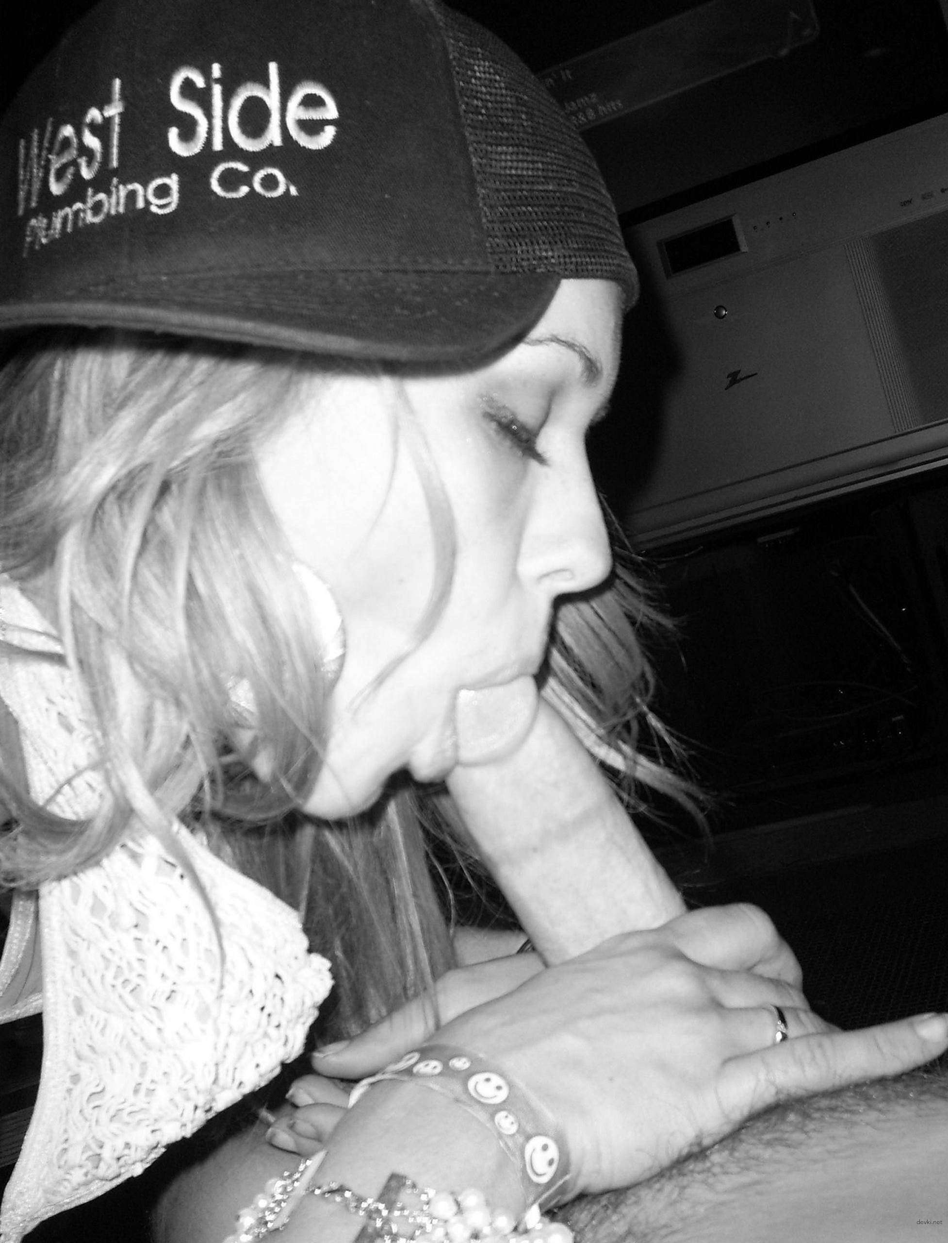 Young wife sucks dick in amateur porn photo