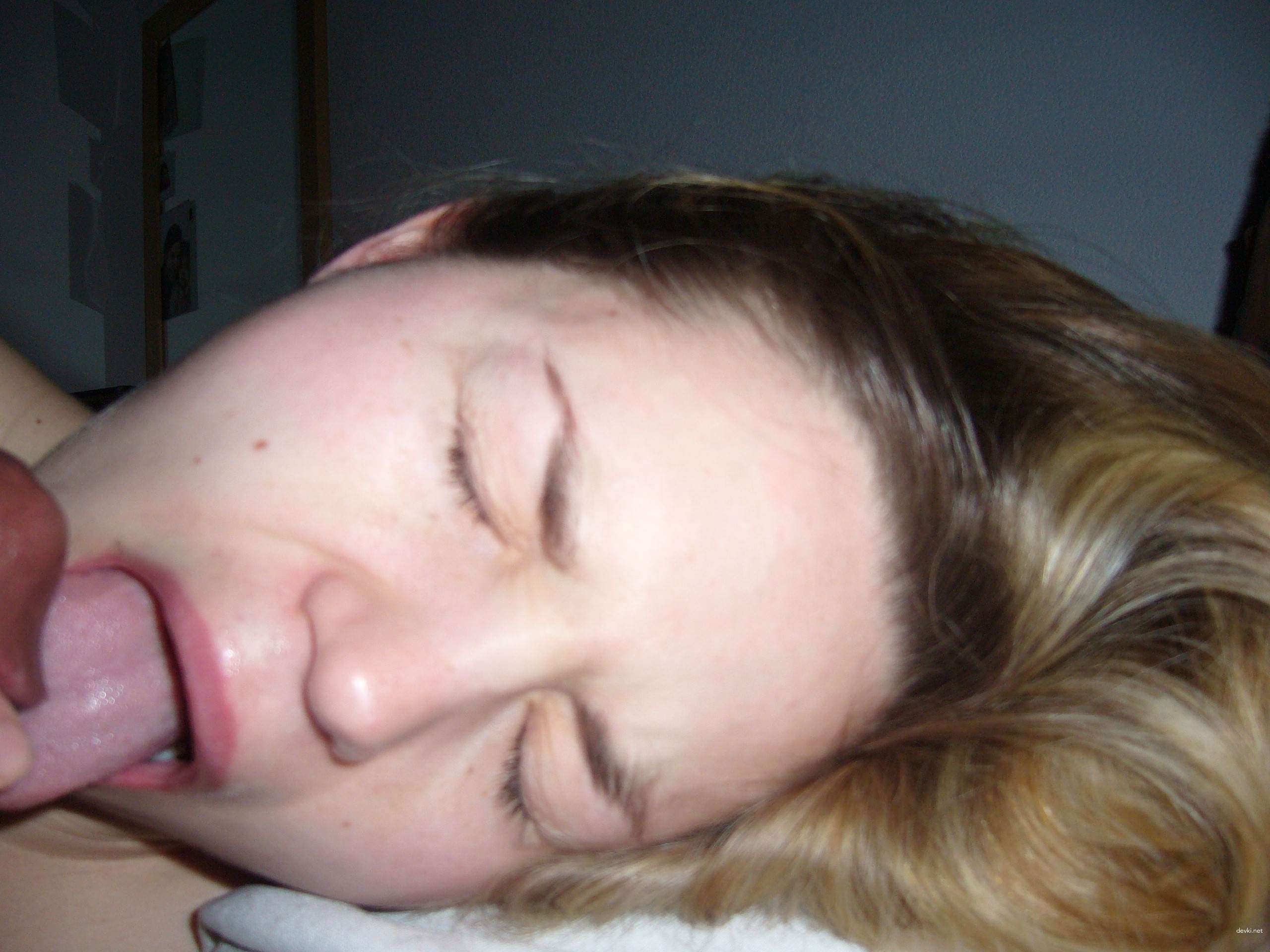 Amateur Slut Sucks Big Black Cock - Explicit Interracial Blowjob Photo