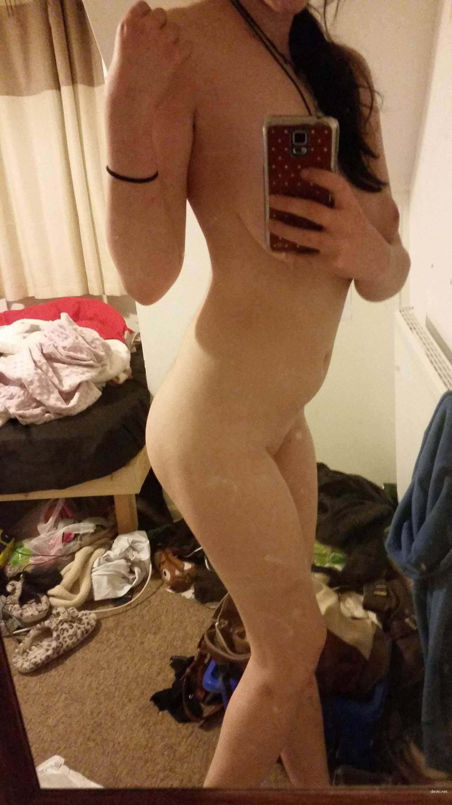 Sexy Amateur Babe Deepthroats Boyfriend's Cock in Explicit Blowjob Photo