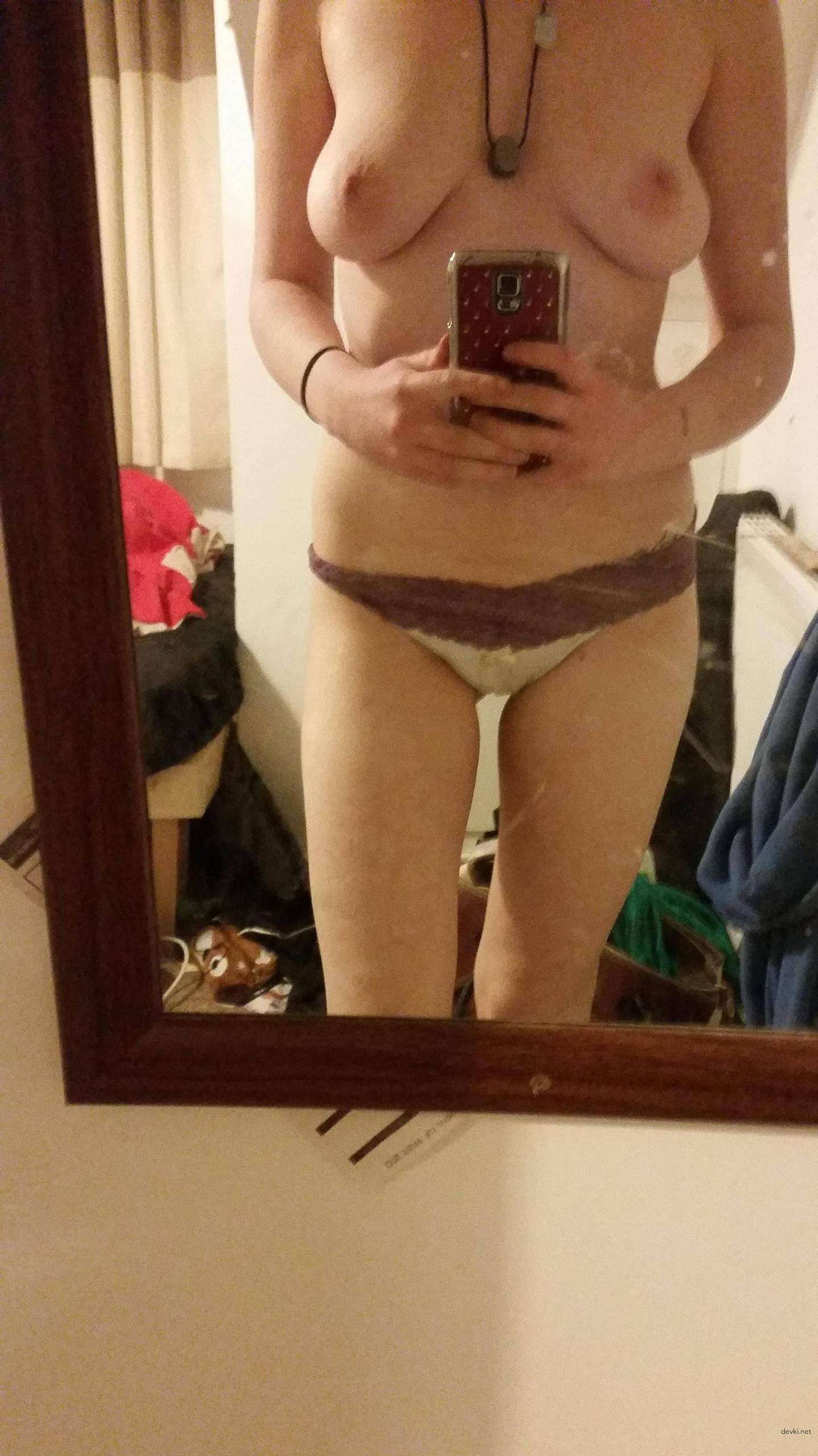 Sexy Amateur Babe Deepthroats Boyfriend's Cock in Explicit Blowjob Photo