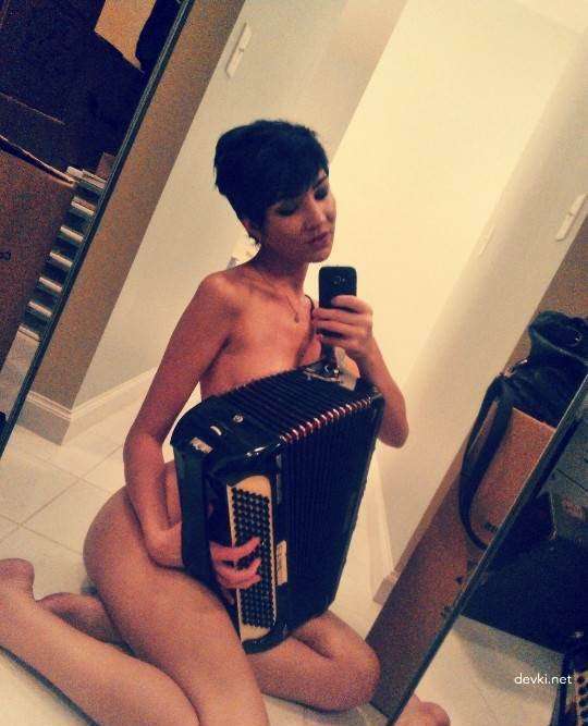 Naked Babes Pose with Musical Instruments in Amateur Porn Pics