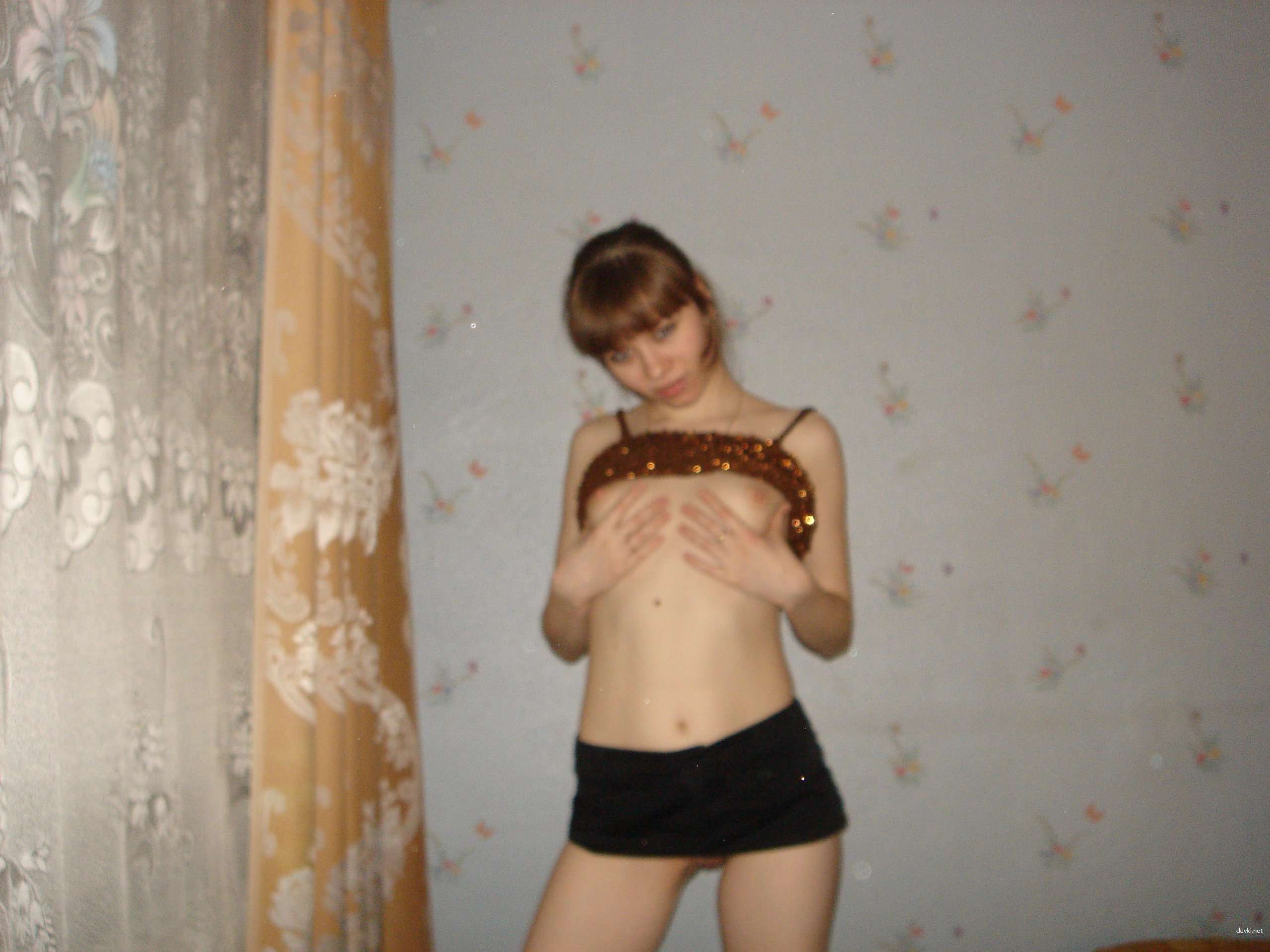 Young wife poses with family friend in amateur porn photo shoot