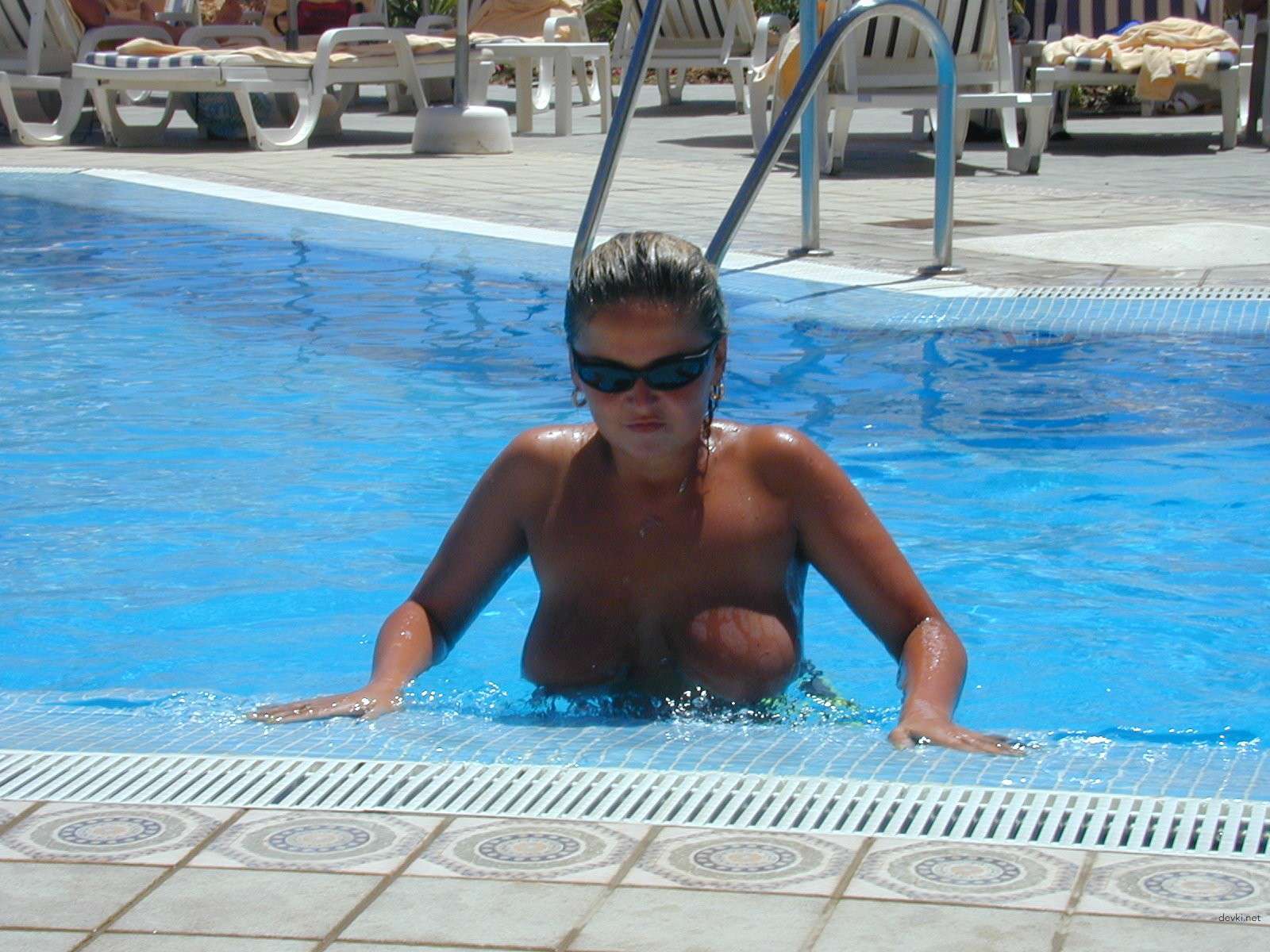 Amateur Busty Blonde Relaxing - Explicit Vacation Boobs Pic