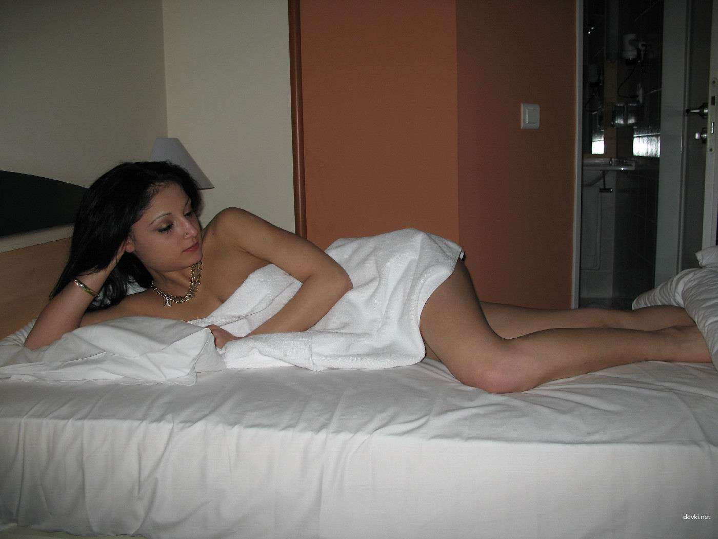 Shy Topless Brunette Amateur Photo - Explicit Nudity and Seduction