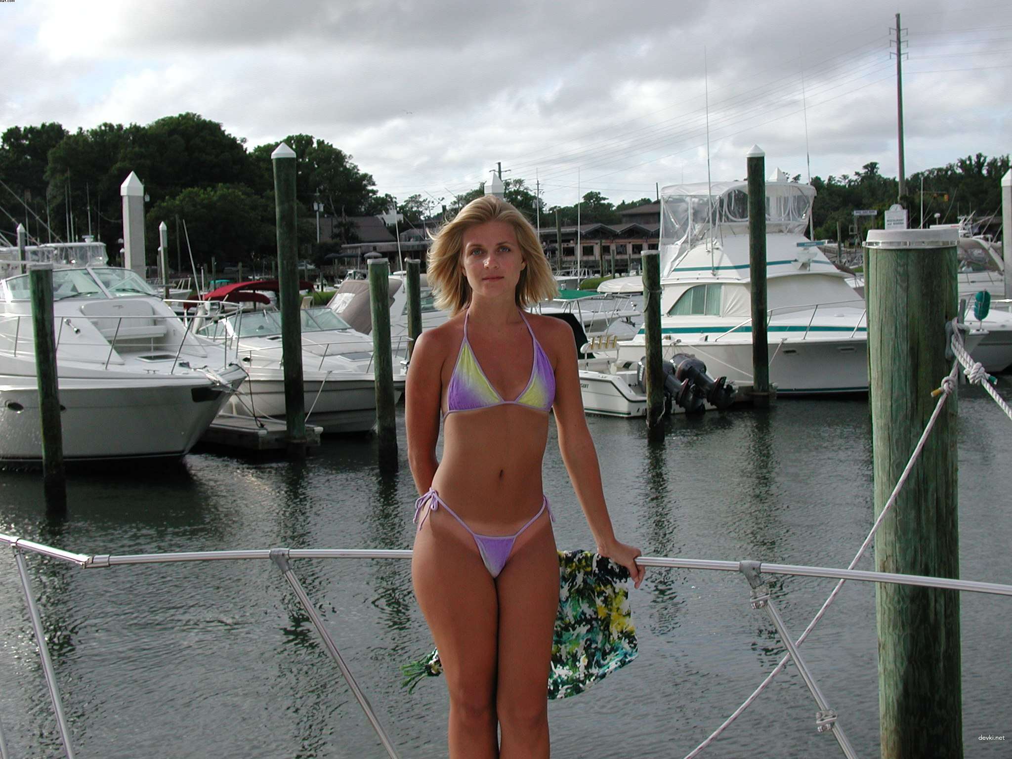 Blonde Babe on Yacht: Amateur Porn Photo with Explicit Content