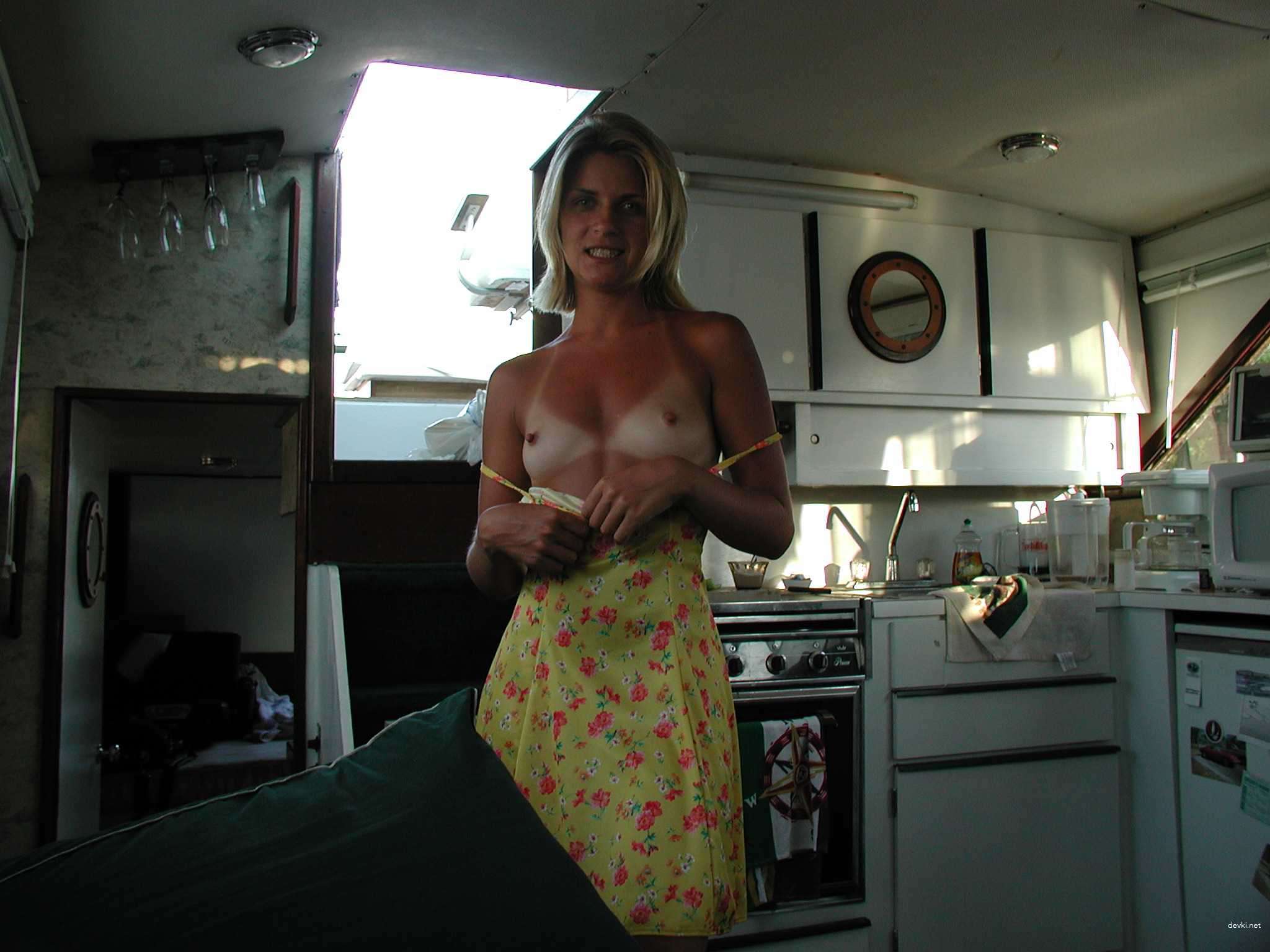 Blonde Babe on Yacht: Amateur Porn Photo with Explicit Content