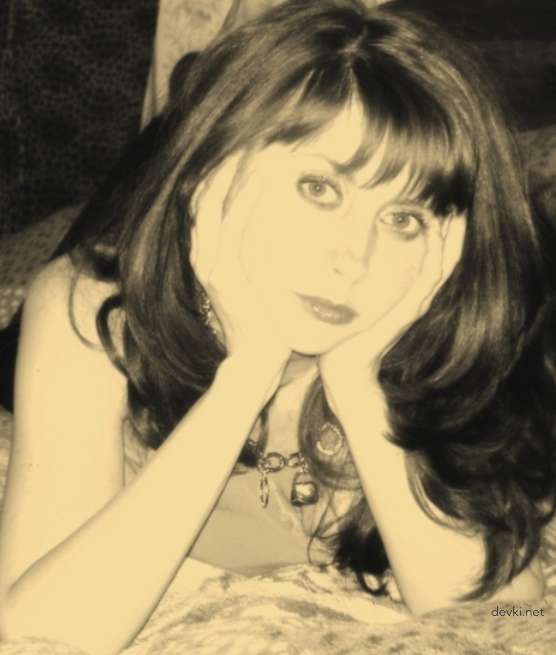 Big-titted beauty fucks her trainer in amateur porn photo shoot