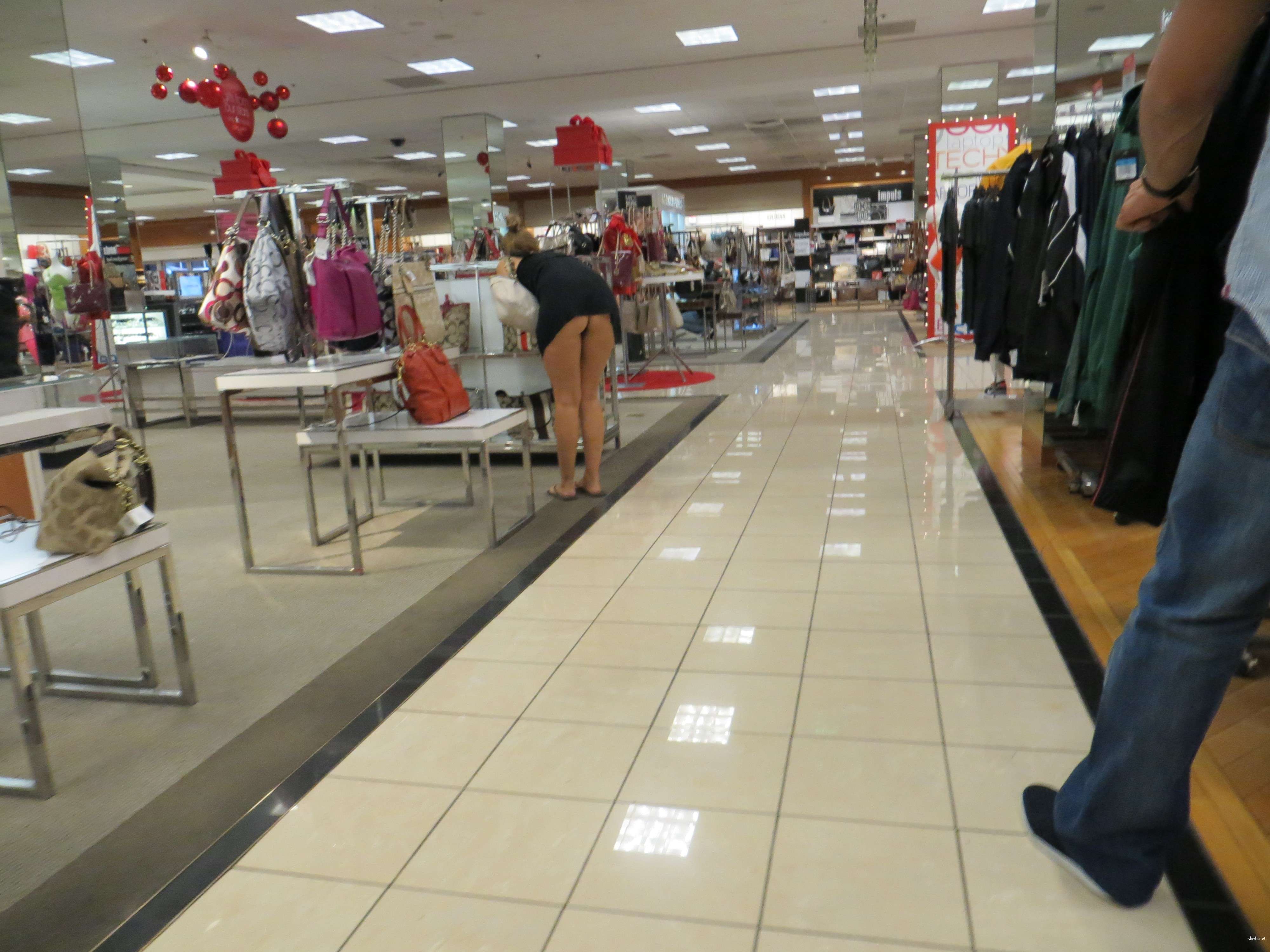 Girl flaunts her assets in public - Amateur porn pic