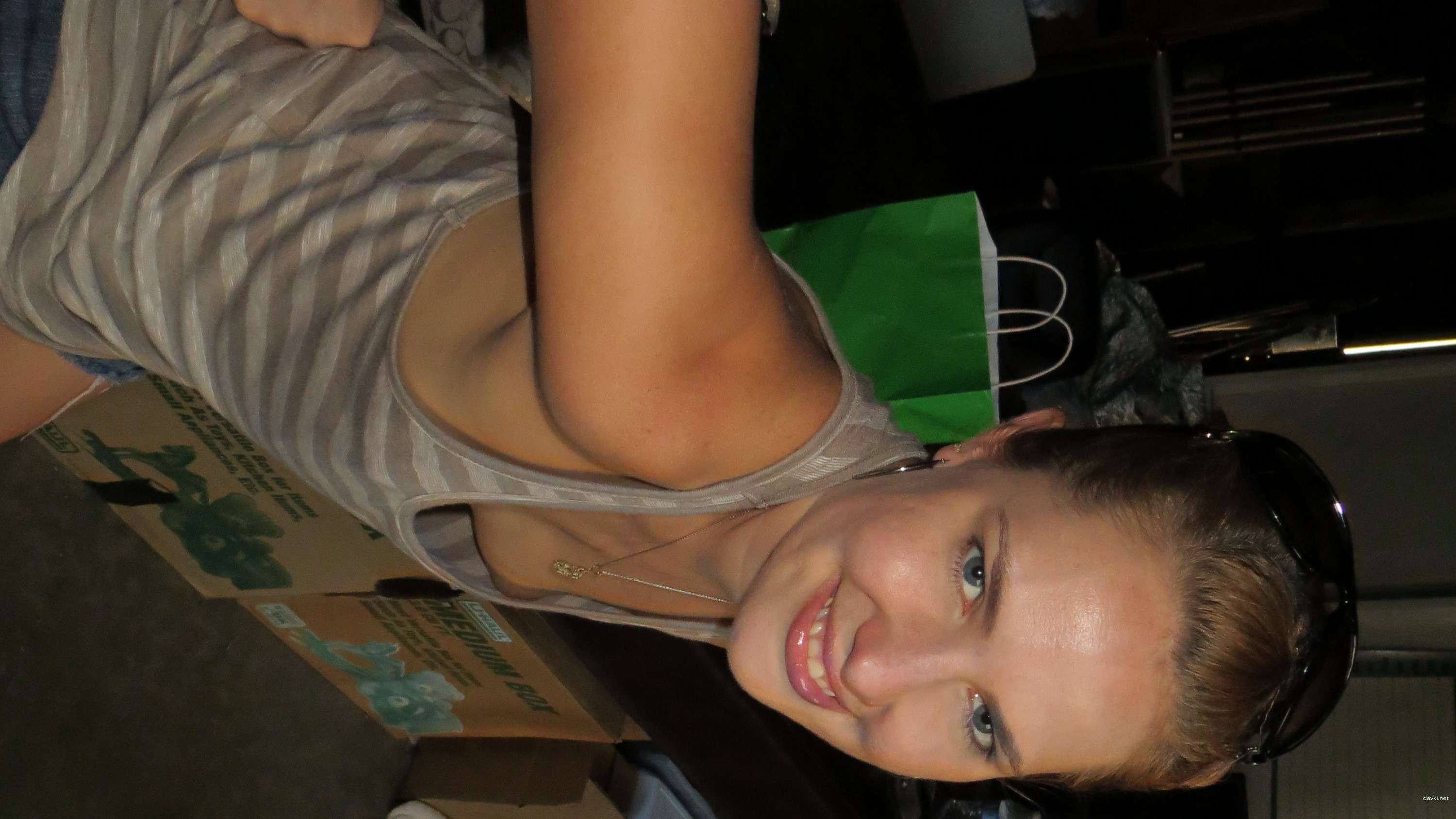 Girl flaunts her assets in public - Amateur porn pic