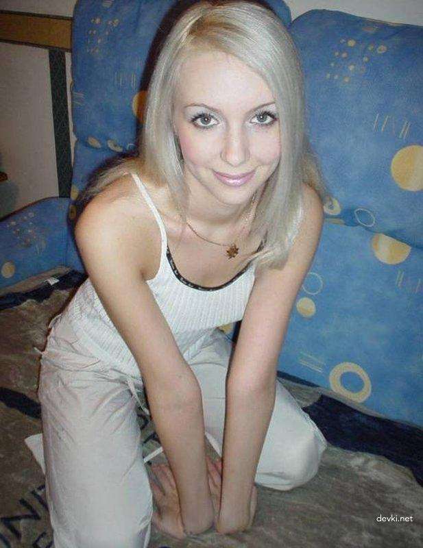 Blonde babe uses sex toy for pleasure in amateur porn pic