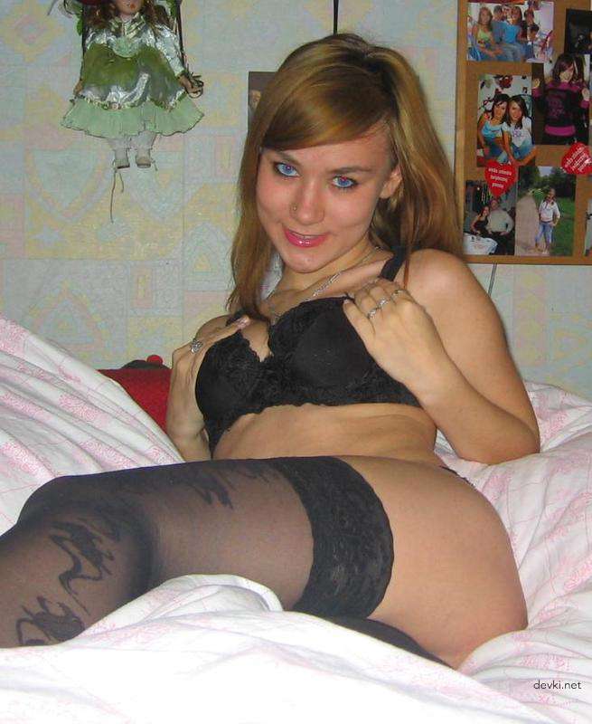 Sexy Girl in Stockings Poses on Bed - Amateur Porn Photo