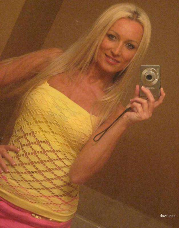 Blonde Slut Covered in Oil Takes Cumshot in Mouth - Amateur Porn Photo