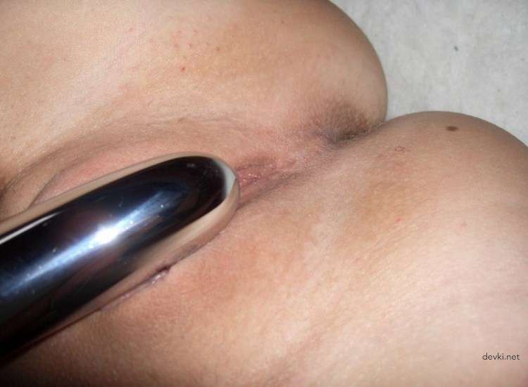 Amateur Woman Exposes Intimate Parts Up Close in Explicit Porn Photo