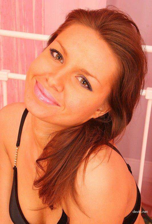 Amateur Girl Masturbates with Dildo in Explicit Porn Photo