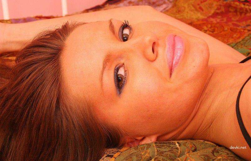 Amateur Girl Masturbates with Dildo in Explicit Porn Photo