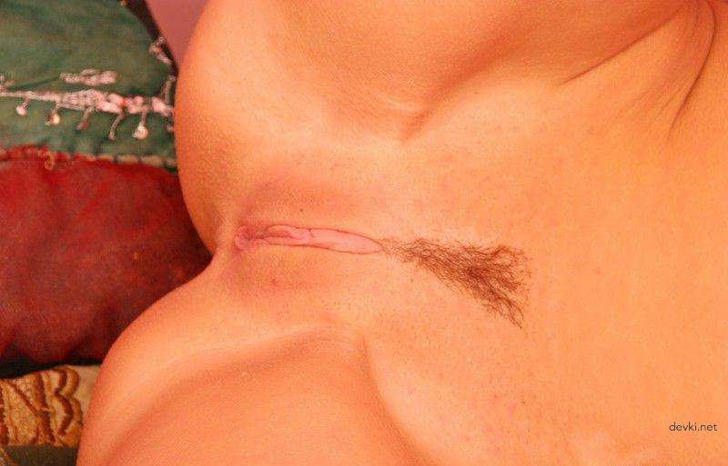 Amateur Girl Masturbates with Dildo in Explicit Porn Photo