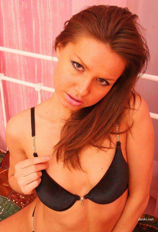 Amateur Girl Masturbates with Dildo in Explicit Porn Photo