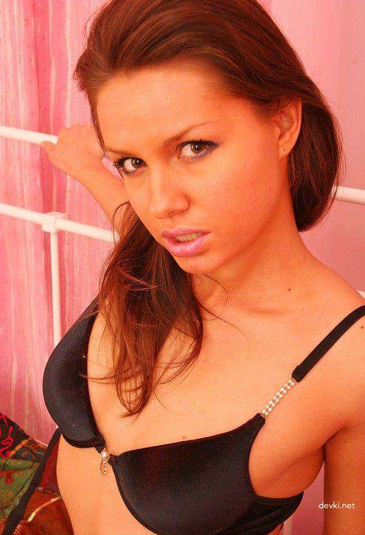 Amateur Girl Masturbates with Dildo in Explicit Porn Photo