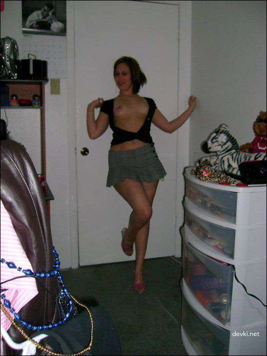 Nude Brunette in Gray Skirt: Explicit Amateur Photo Shoot