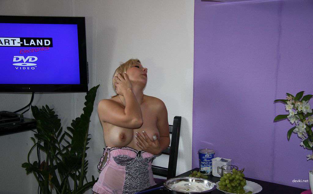 Naked Woman Masturbating with Vibrator: Explicit Amateur Porn Photo