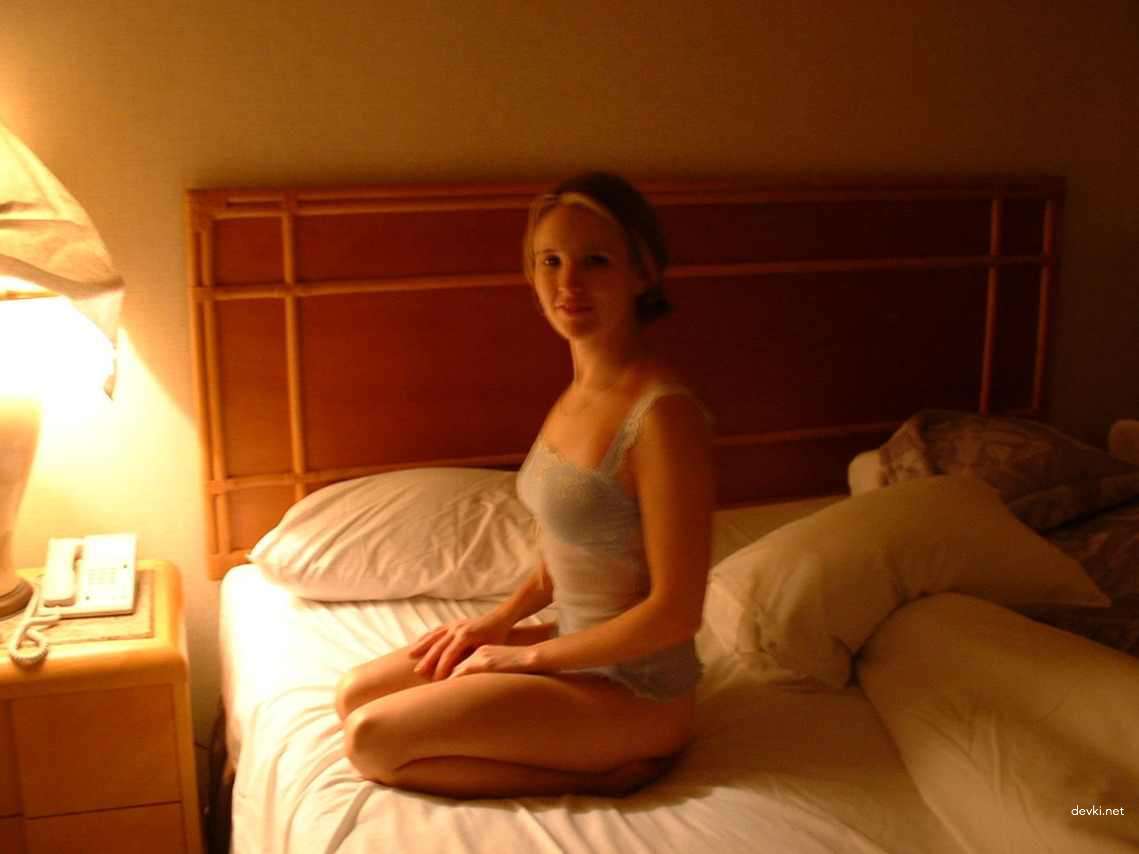 Passionate woman displays hairy pussy in amateur porn pic