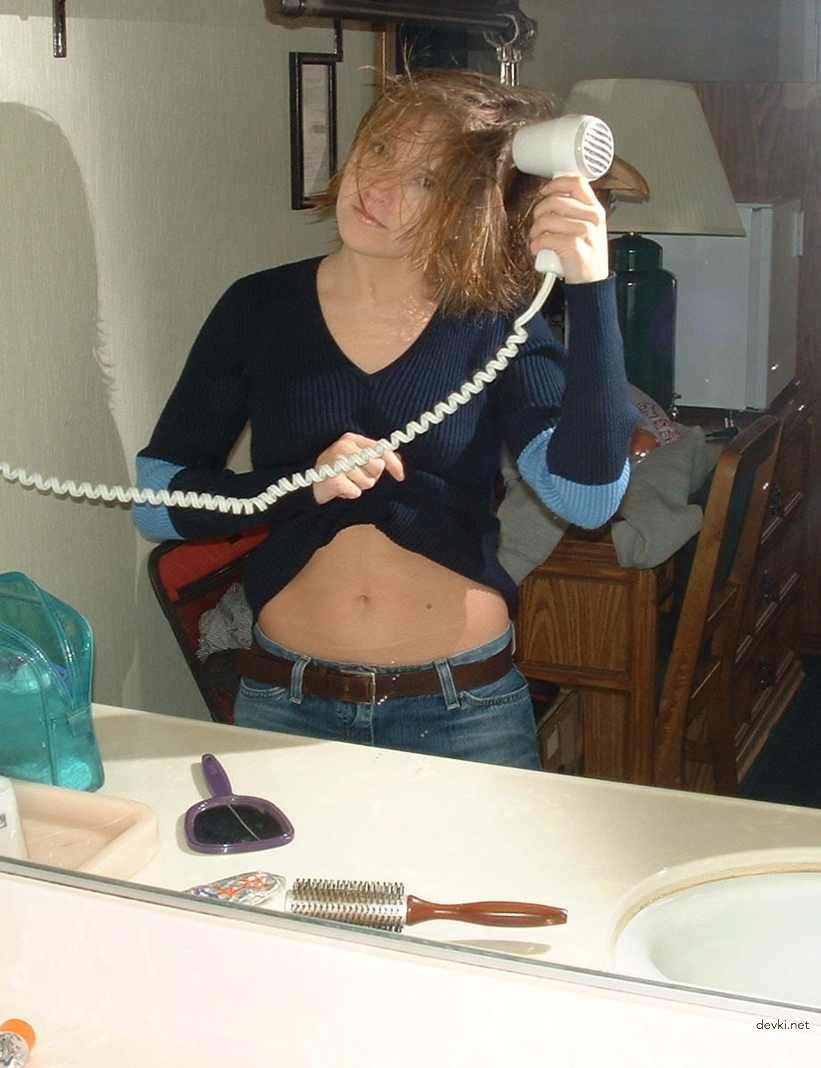 Passionate woman displays hairy pussy in amateur porn pic