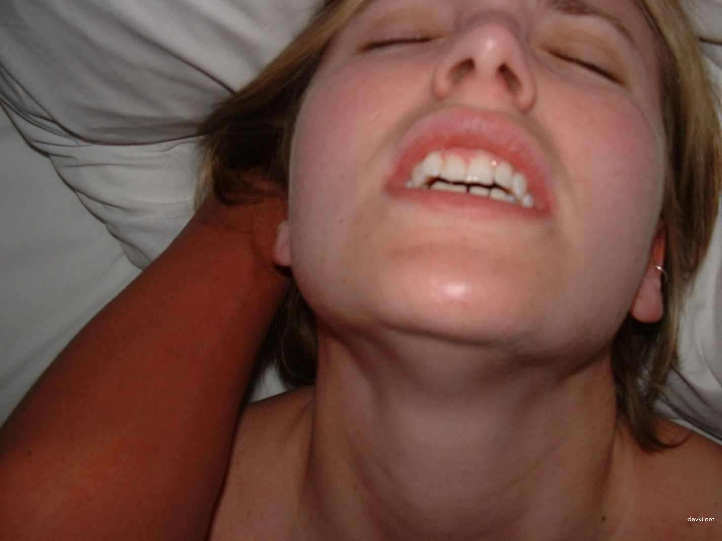 Passionate woman displays hairy pussy in amateur porn pic