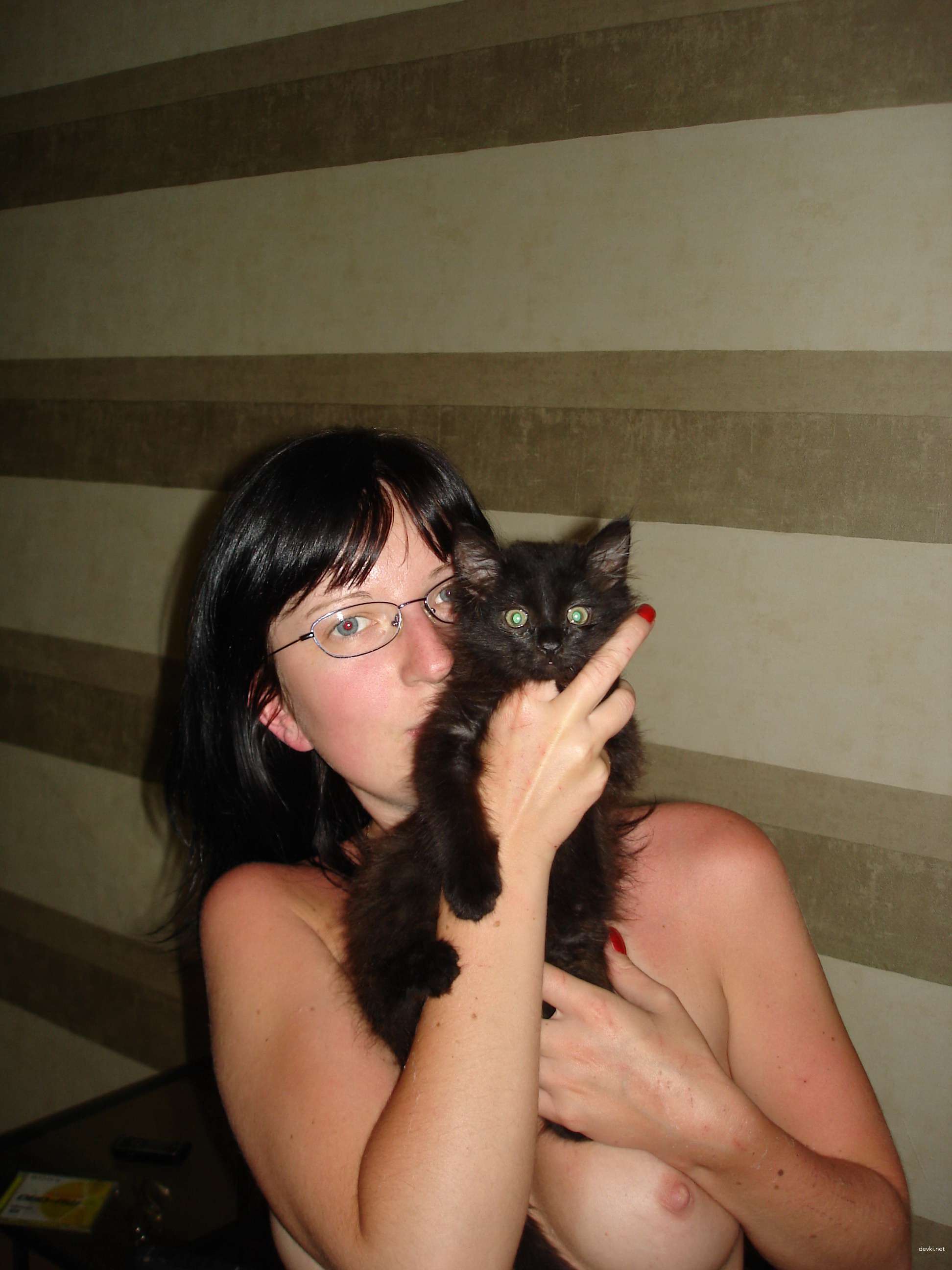 Amateur Home Photos: Explicit Intimate Moments Captured in Russian Setting