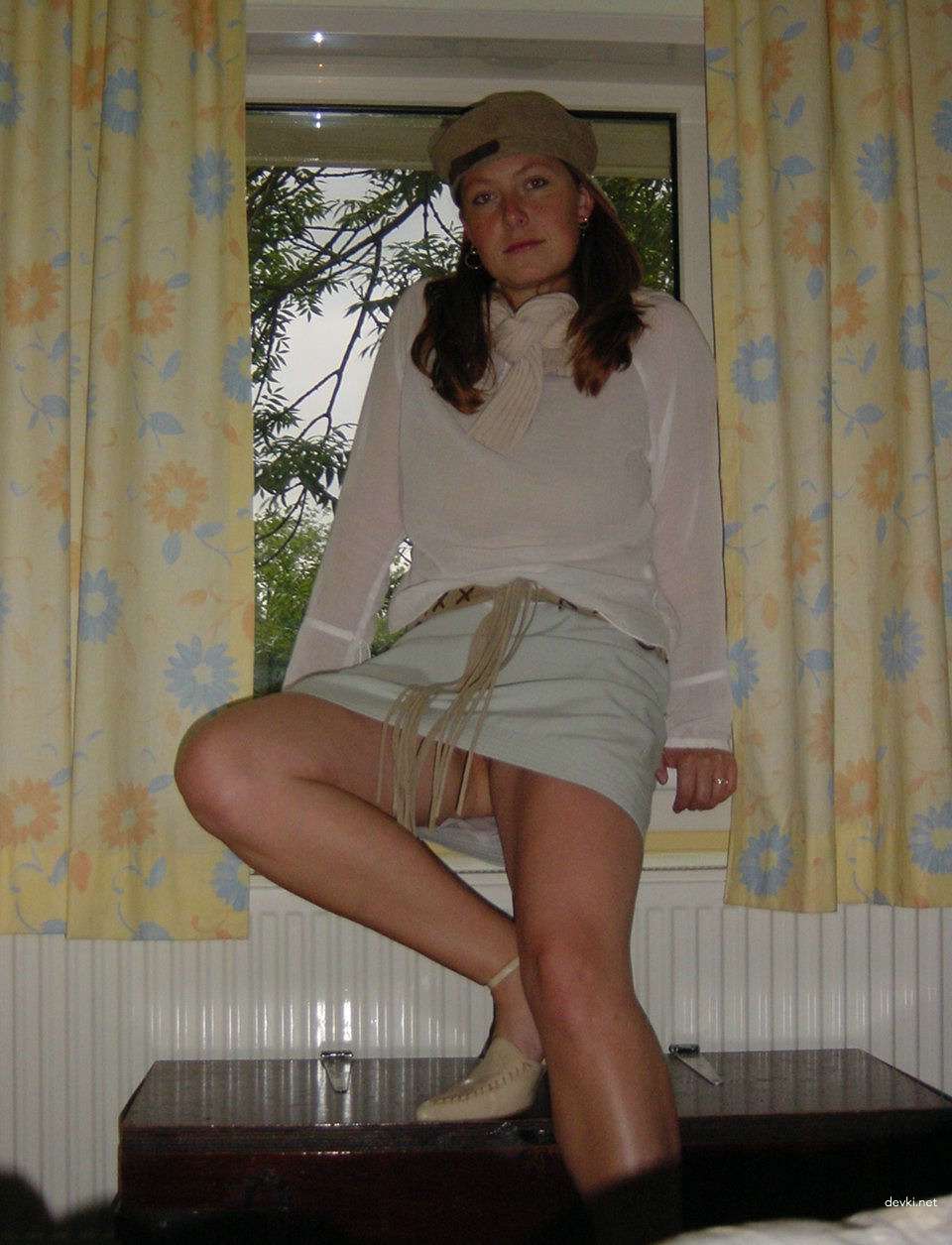 Fiery Redhead Exposes Her Shaved Pussy in Amateur Porn Pic