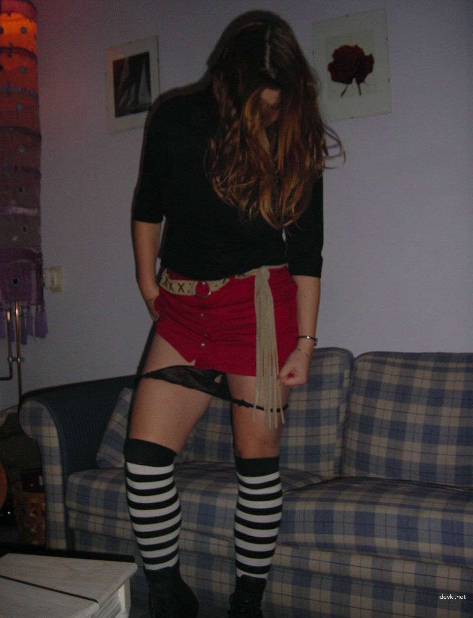 Fiery Redhead Exposes Her Shaved Pussy in Amateur Porn Pic