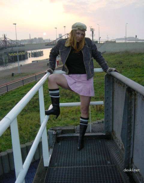 Fiery Redhead Exposes Her Shaved Pussy in Amateur Porn Pic