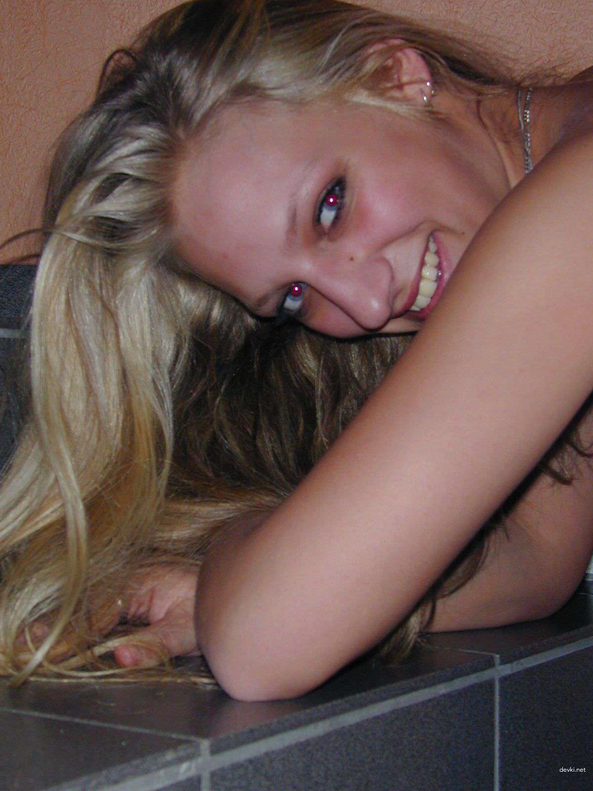 Naked Blonde Poses on Staircase: Amateur Explicit Photo
