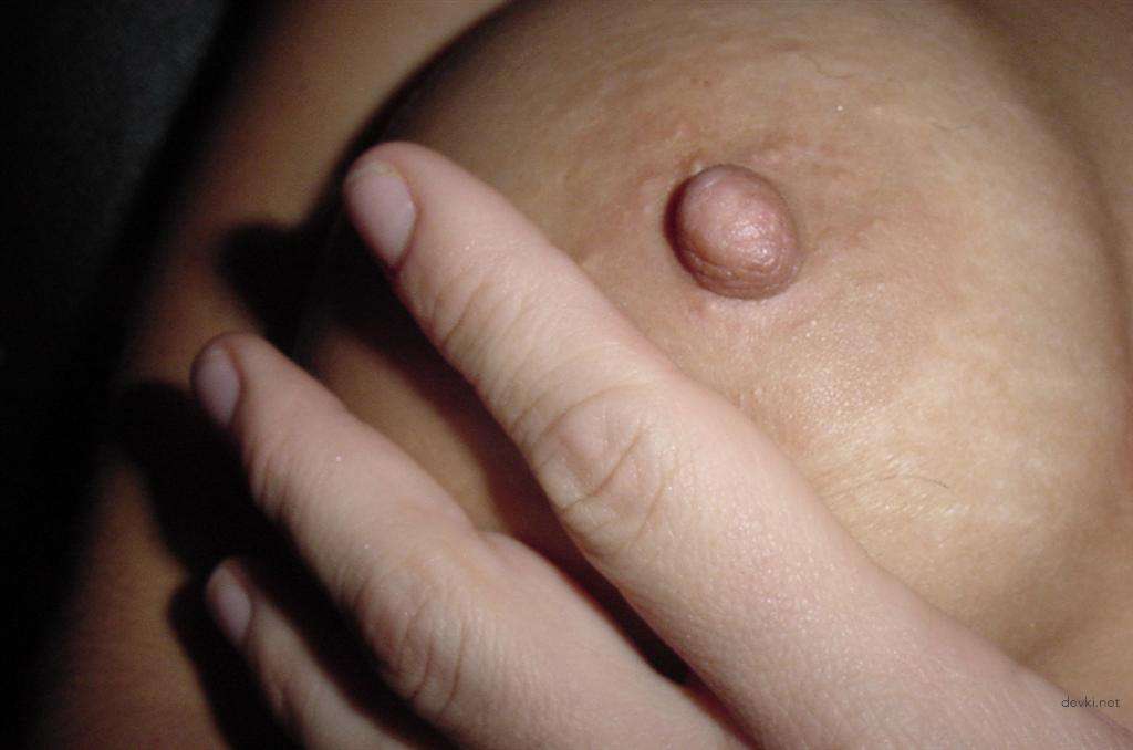 Slender Girl with Silicone Tits in Amateur Porn Photo Shoot