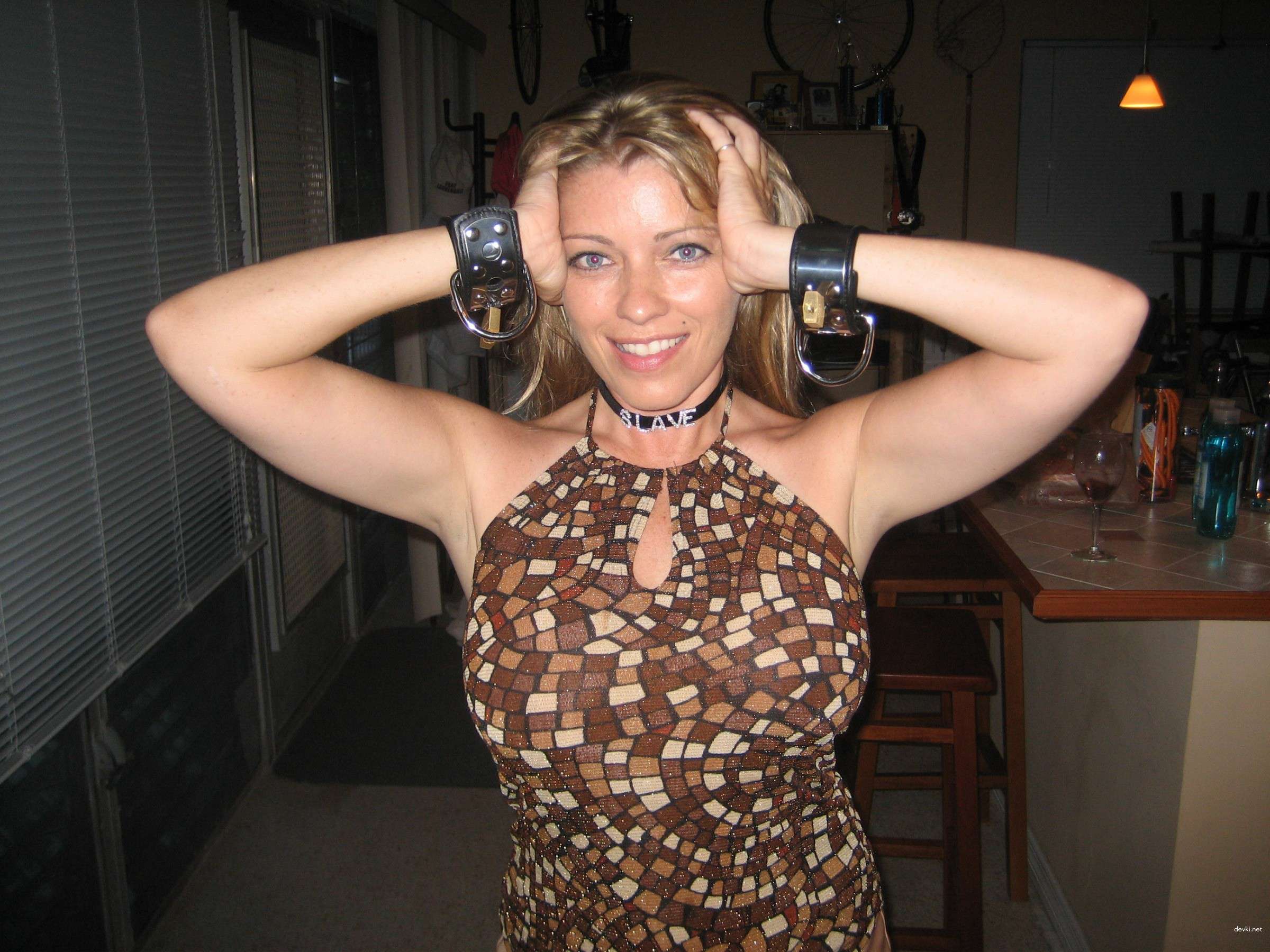 Raunchy Home Blowjob in Handcuffs - Amateur Porn Photo