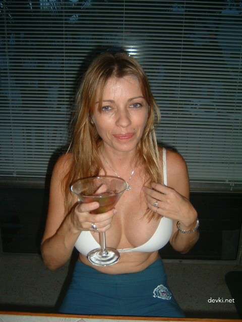 Raunchy Home Blowjob in Handcuffs - Amateur Porn Photo