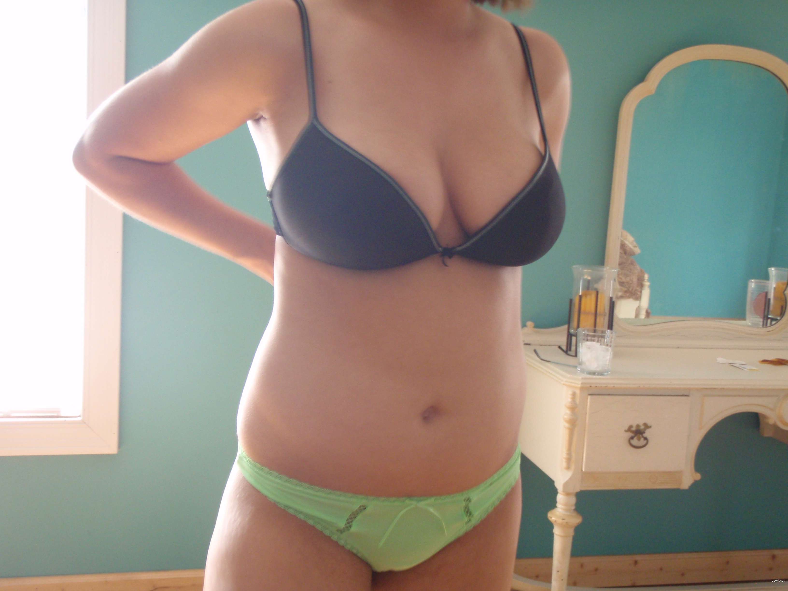 Intimate Amateur Sex Photos: Woman Engages in Passionate Sex