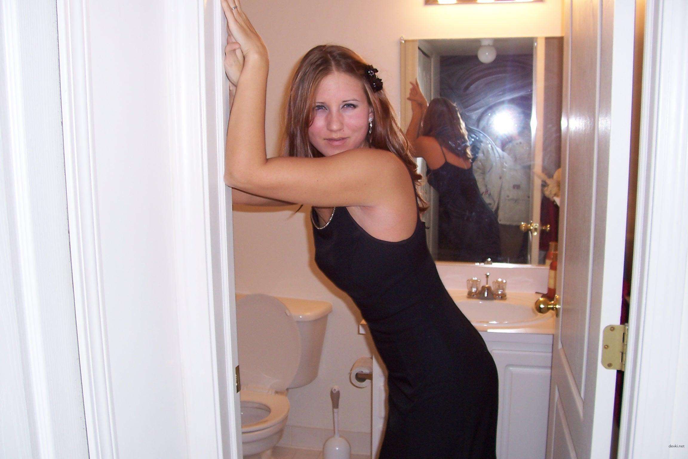 Seductive Woman in Black Dress - Explicit Amateur Sex Photo