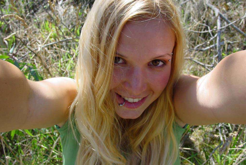 Blonde with Lip Piercing Poses Sexily: Amateur Explicit Photo