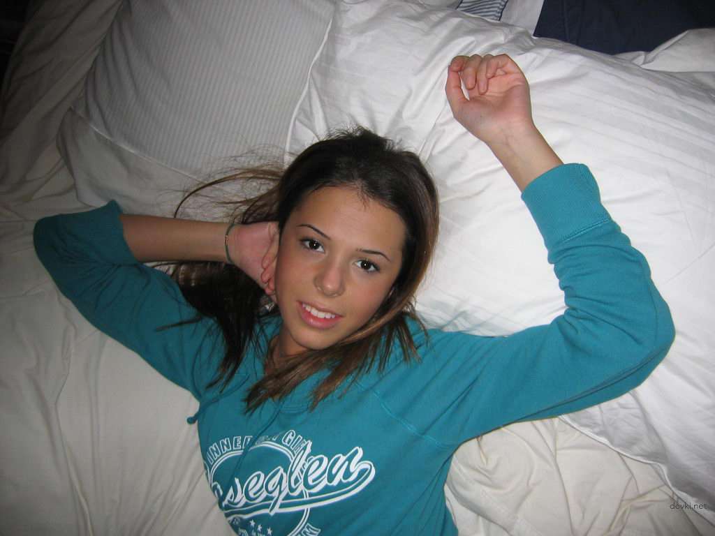 Playful girl posing and sucking dick - Amateur porn photo