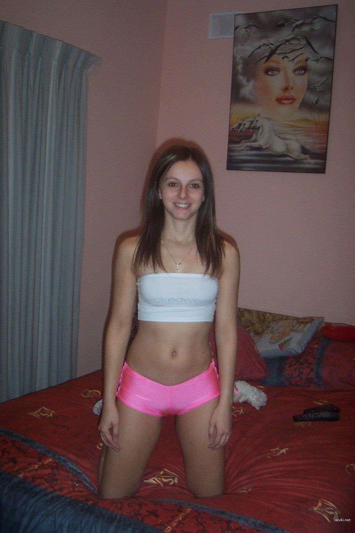 Slender Nude Girl Poses Explicitly in Amateur Photo Shoot