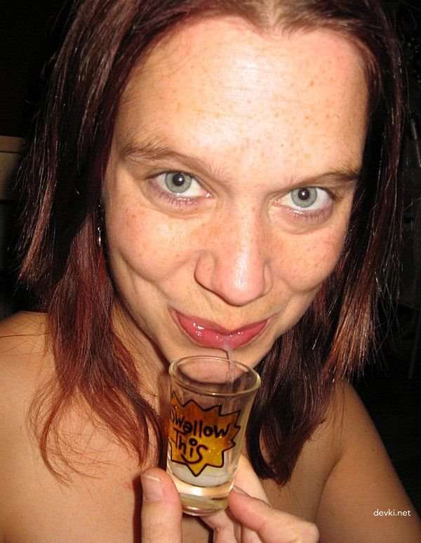 Fiery Redhead Covered in Cum: Amateur Porn Photo