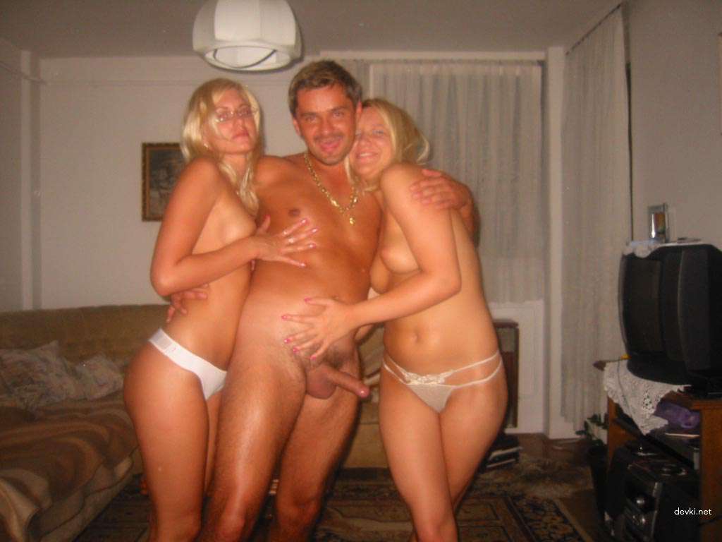 Hot Threesome Action: Guy Having Fun with Two Blondes in Amateur Porn Pics