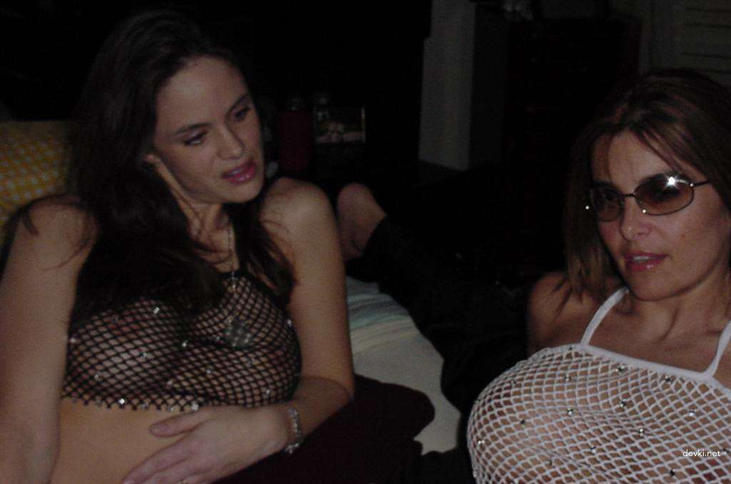 Hot Girl with Silicone Tits in Amateur Porn Pics