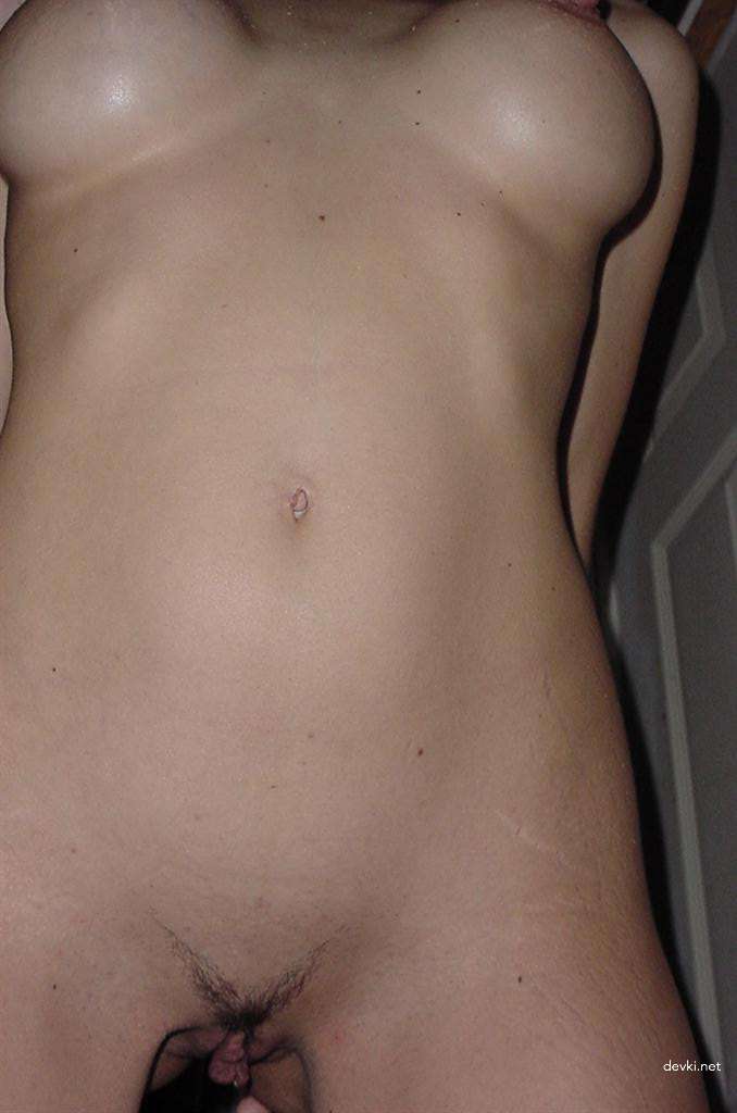 Hot Girl with Silicone Tits in Amateur Porn Pics