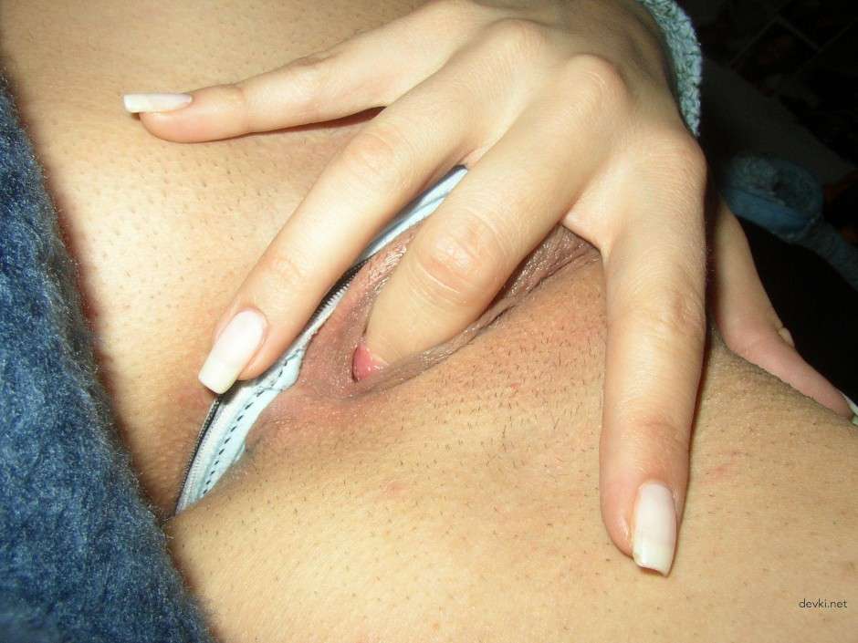 Brunette Babe Exposes Her Assets in Amateur Porn Pic