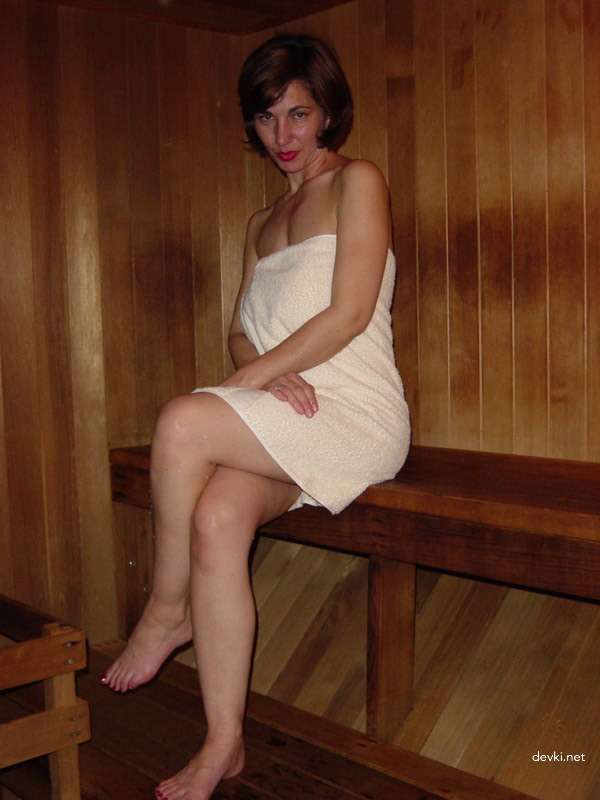 Mature Woman Explicitly Poses in Sauna: Amateur Photo Session